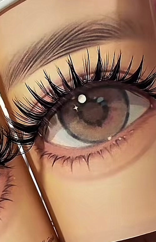 Close-up of an eye with long eyelashes and detailed makeup
