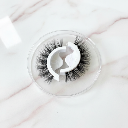 Lashes on marble with pink accents