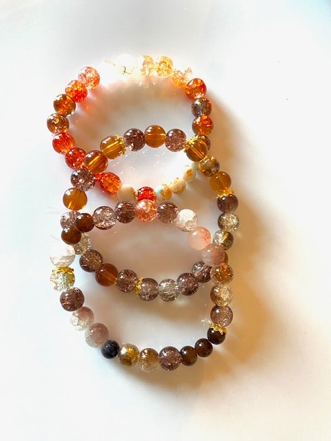 Brown and gold glass bead bracelet set.  Handmade with love.  Each bracelet is unique in style and color.  